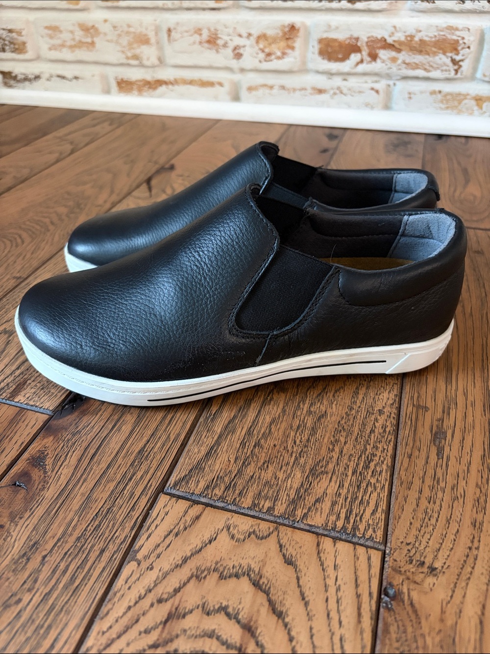 Birkenstock Black Slip-On Loafers with White Contrast Sole